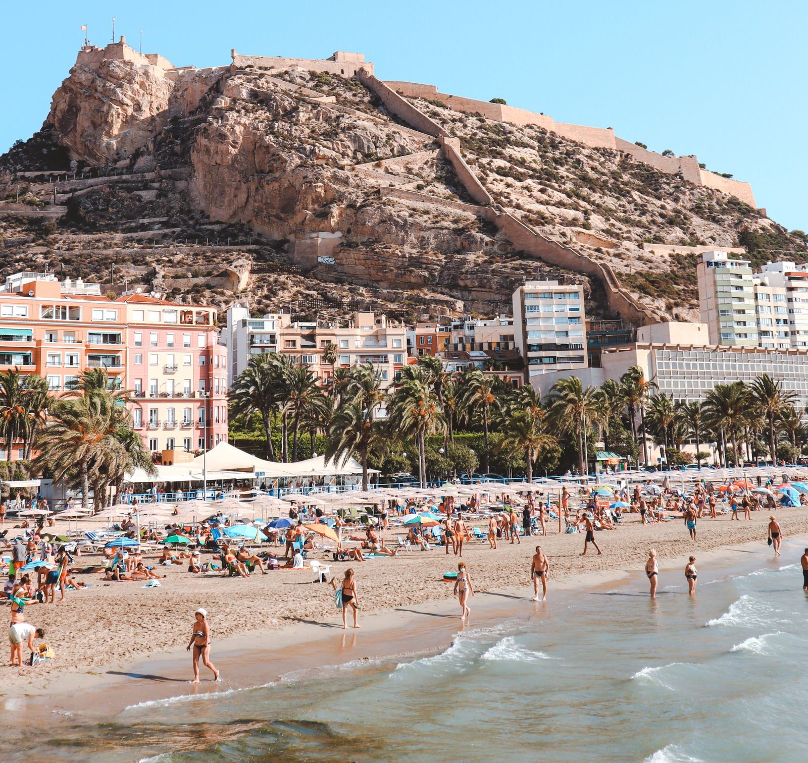 Postiguet beach and Santa Bárbara Castle in Alicante, Spain